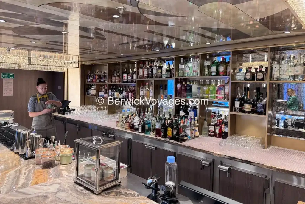 Top-shelf liquor selection at Founders Bar on Oceania Allura, the ship's premium cocktail venue