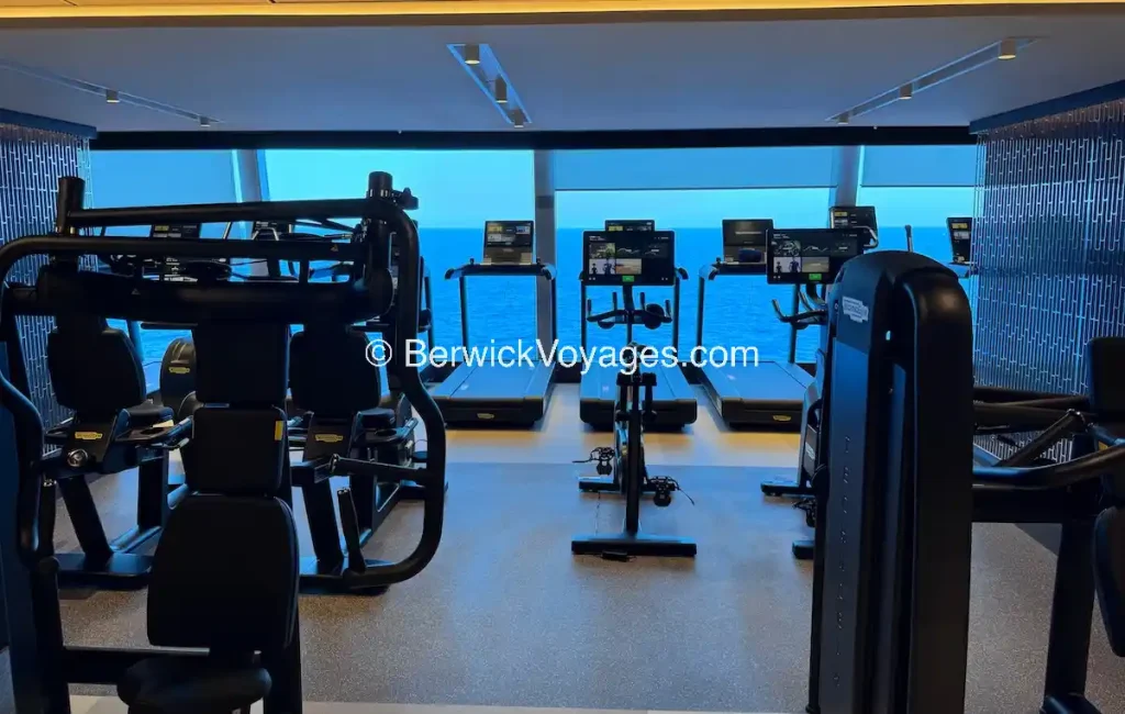 Oceania Allura fitness center with oceanview workout machines, group class studio, and personal training facilities