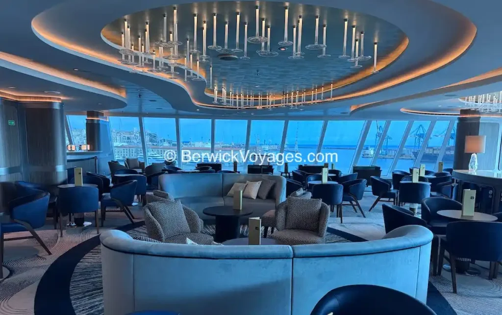 Horizons Bar on Oceania Allura with floor-to-ceiling windows, photographed during pre-inaugural sailing July 2025